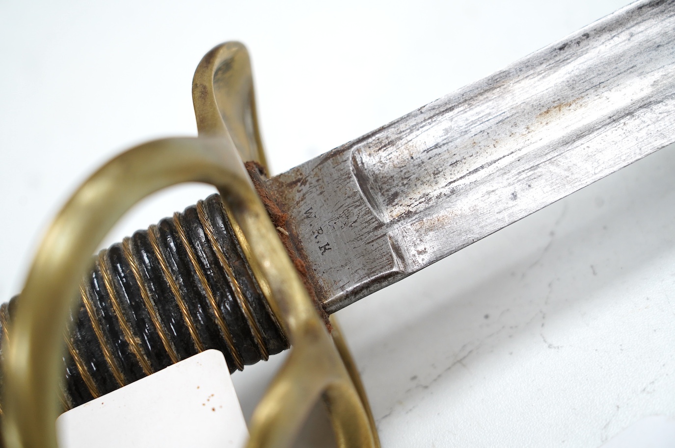 A German c.1860 light cavalry trooper’s sword by WRK, with German government inspector’s marks, 89.5cm. Condition - good